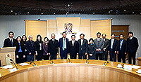 Prof. Joseph Sung (eighth from left) poses for a group photo with Prof. Tan Tieniu (eighth from right) and other delegates